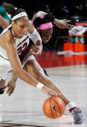 South Carolina forward A'ja Wilson (22) grabs a rebound against College of Charleston during the first half of an NCAA college basketball game Tuesday, Dec. 3, 2017, in Columbia, S.C. (AP Photo/Sean Rayford)
