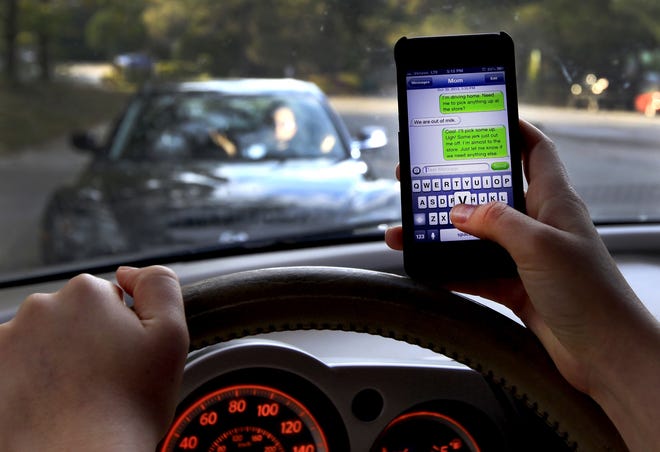 The legislation would allow law-enforcement officers to pull over motorists if they see them texting or emailing. Currently, texting while driving is a secondary offense, meaning officers can only charge motorists with texting violations during traffic stops for other offenses, such as speeding. [Gatehouse Media File]