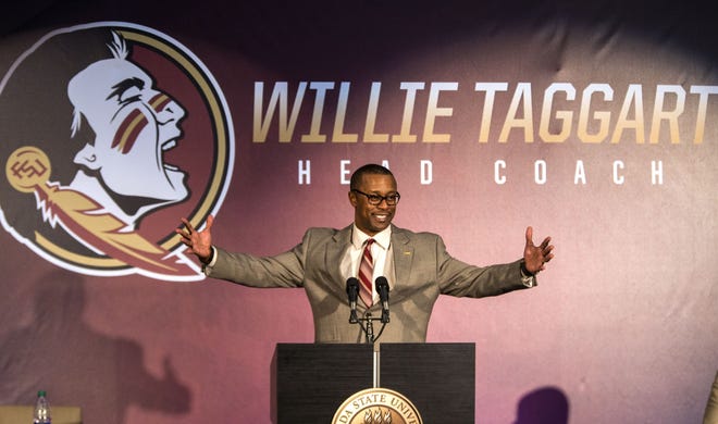 Willie Taggart gestures as he is introduced as Florida State's new football coach during an NCAA college football news conference in Tallahassee on Wednesday. [MARK WALLHEISER/AP PHOTO]