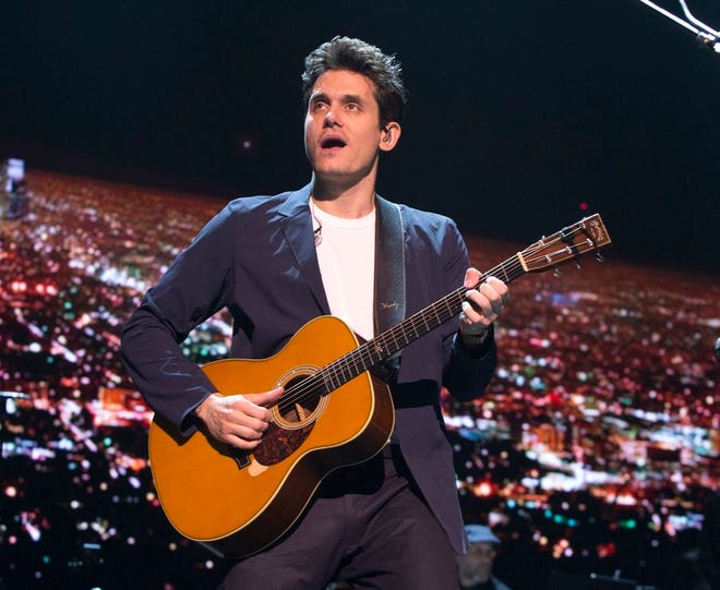 John Mayer performs in concert during his "The Search for Everything Tour" in Philadelphia on April 7, 2017. Mayer has been hospitalized for an emergency appendectomy. The Grammy-winning musician was admitted to the hospital on Tuesday, Dec. 5, according to a rep. The singer-guitarist was due to perform later that night at a concert with the Dead & Company, but that date has now been postponed.