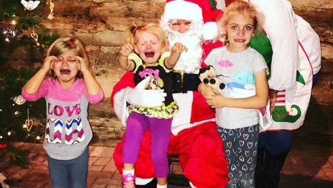 Reader Rachel Bruce says "The Bruce girls were thrilled to see Santa."