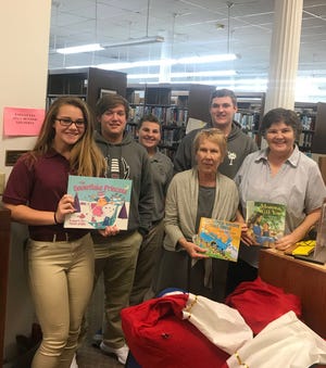 Special to JCST Thomas Heyward Academy’s Fellowship of Christian Athletes collected 100 books last week to donate to Ridgeland Pratt Library.