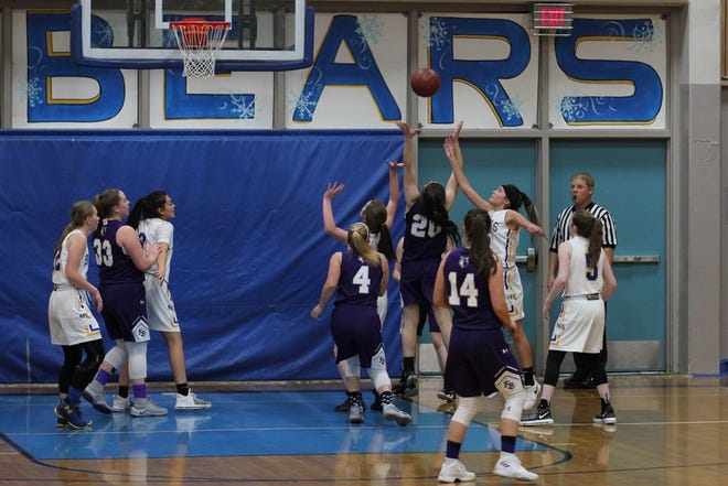 The Mount Shasta Bears girls team (in white) defeated Fort Bragg 42-25 in the final game on the first day of the Holiday Tournament Thursday night in Mount Shasta.
