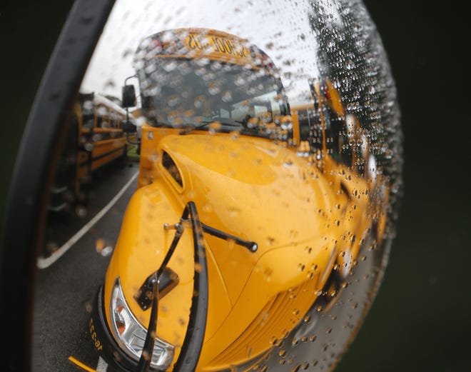 School buses sit in line at the bus garage in Tuscaloosa on Aug. 10, 2016, before school begins. [Staff file photo/Gary Cosby Jr.]