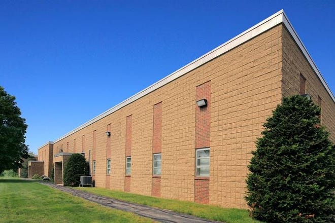 Calare Properties, a private Massachusetts-based real estate investment firm and operator, recently acquired 15-21 University Road in Canton. [Courtesy photo]
