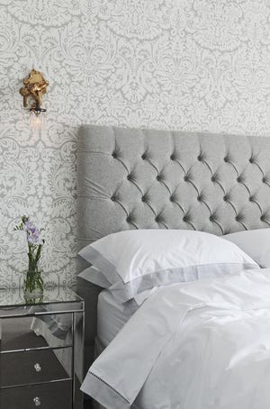 Farrow & Ball's textured damask wallpaper cozies up a tiny boudoir. [Photo/Luke Brown Photography]