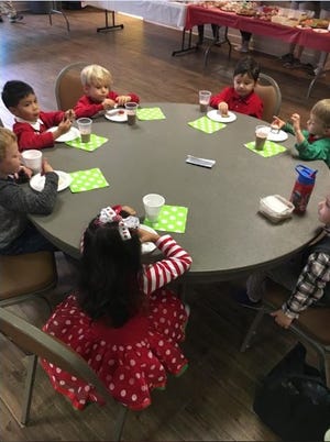 The students of Holy Spirit Catholic Preschool and Elementary School had plenty of cookies to select from and had the opportunity to have their picture made with Father Christmas on Dec. 4.