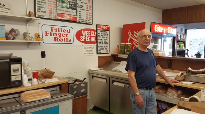 John Pay, owner of Two Brothers Subs on Main Street in Somersworth, said he will retire the business at the end of the month. [Judi Currie/Fosters.com]