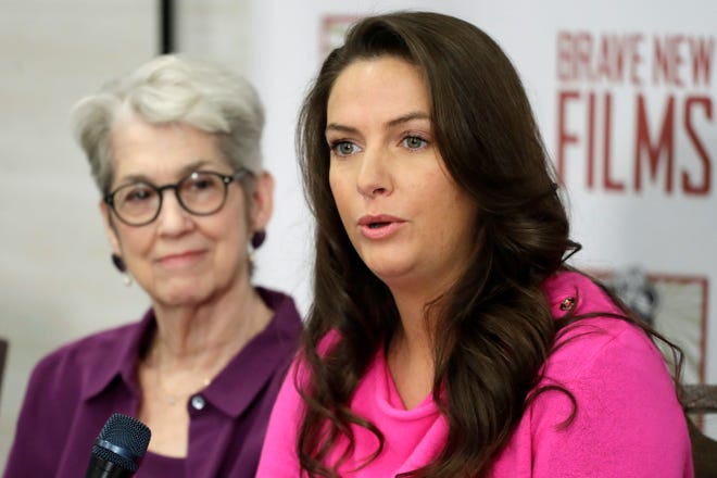Jessica Leeds, left, and Samantha Holvey attend a news conference, Monday, Dec. 11, 2017, in New York to discuss their accusations of sexual misconduct against Donald Trump. The women, who first shared their stories before the November 2016 election, were holding the news conference to call for a congressional investigation into Trump's alleged behavior. (AP Photo/Mark Lennihan)