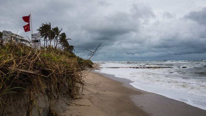 In October, heavy seas cause erosion at Midtown Beach in Palm Beach. (Joseph Forzano / Daily News File Photo)