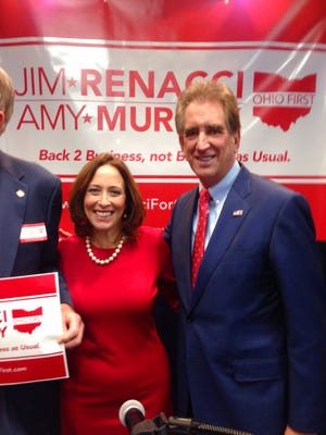 Republican congressman Jim Renacci introduces Cincinnati councilwoman Amy Murray as his running mate for the 2018 Ohio governor primary, Monday, Dec. 11, 2017, in Cincinnati. (AP Photo/Dan Sewell)