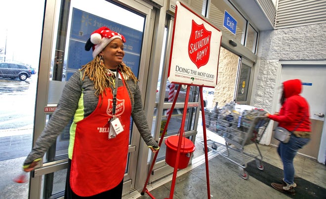 Minnie Hambrick rings the bell for Salvation Army at Walmart of Shelby on Friday. [Brittany Randolph/The Star]