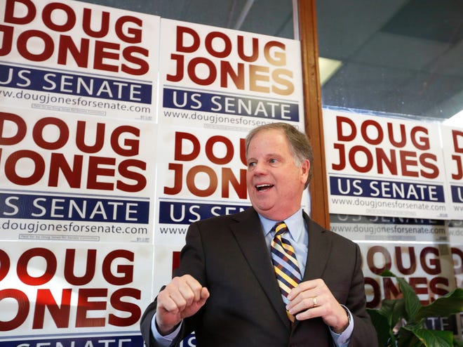 Doug Jones speaks during a campaign rally in Birmingham, Ala. Sunday. Jones, a Democrat who once prosecuted two Ku Klux Klansmen in a deadly church bombing and has now broken the Republican lock grip on Alabama, is the state’s new U.S. senator. [AP Photo/Brynn Anderson]