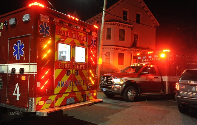 Patients are given medical aid in two city rescue vehicles on the corner of Pine and Winter streets on Wednesday evening. [Herald News Photo | Jack Foley]