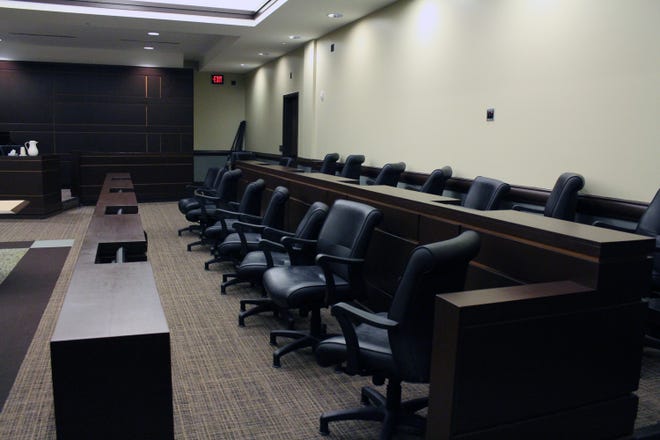 The jurors' seats remain empty as the 12 jurors deliberate about whether Aaron Young is guilty of murder on Tuesday, Dec. 12. [Audra Gamble/Sentinel staff]