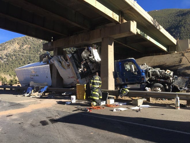 A Canton area man was killed, and his passenger, seriously injured in this semitrailer crash near Denver. (Photo courtesy Colorado Highway Patrol)
