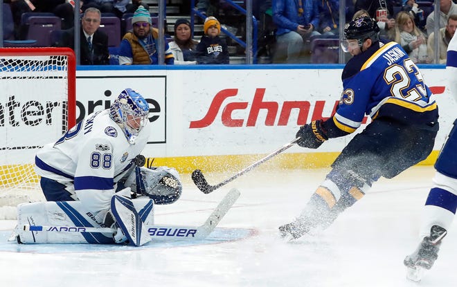St. Louis Blues' Dmitrij Jaskin is unable to score past Tampa Bay Lightning goalie Andrei Vasilevski during the second period of Tuesday night's NHL hockey game in St. Louis. [THE ASSOCIATED PRESS / JEFF ROBERSON]