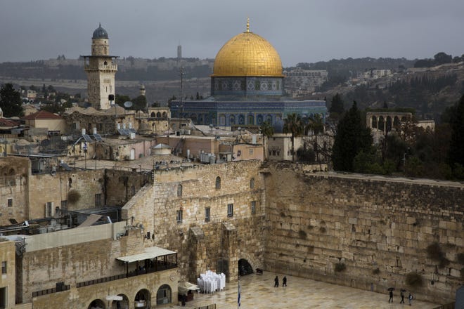 A view of the Western Wall and the Dome of the Rock, some of the holiest sites for for Jews and Muslims, in Jerusalem's Old City. President Donald Trump's decision to recognize Jerusalem as Israel's capital could have deep repercussions across the region. [AP Photo/Oded Balilty]