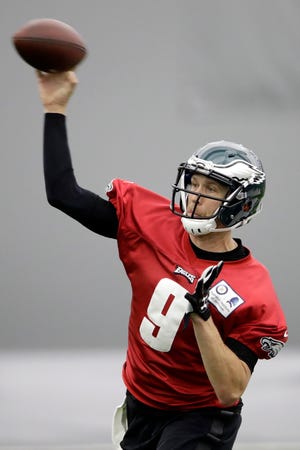 Eagles quarterback Nick Foles throws a pass during practice Thursday, Dec. 14, 2017. [Matt Rourke/Associated Press]