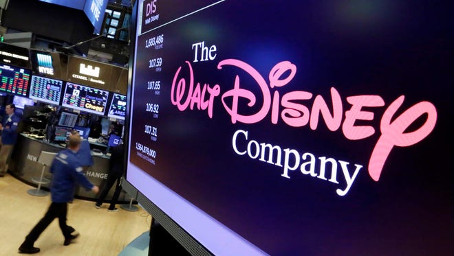 Disney is buying a large part of the Murdoch family’s 21st Century Fox in a $52.4 billion deal, announced Thursday, Dec. 14, including film and television studios, cable and international TV businesses as it tries to meet competition from technology companies in the entertainment business. (AP Photo/Richard Drew, File)