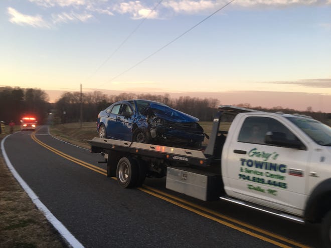 According to Highway Patrol, another vehicle crossed the center line and drove into this blue sedan head-on around 4 p.m. Thursday along Gaston Webbs Chapel Road in Crouse. [ERIC WILDSTEIN/THE GASTON GAZETTE]