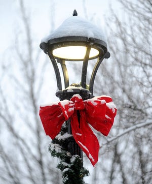 Fall River Christmas decorations on a lamp post on Columbia St. [Herald News Photo / Dave Souza]