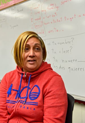 Keity Santana talks about the program at The Center for Language and Culture at Kings Trail Elementary and her family’s experience after coming to Jacksonville after Hurricane Maria. (Bob Mack/Florida Times-Union)