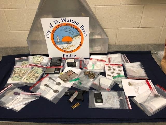 A gun, drugs and drug paraphernalia were among the items recovered by police who executed a narcotics search warrant at a Fort Walton Beach residence Dec. 8. [JO SORIA/CONTRIBUTED PHOTO]