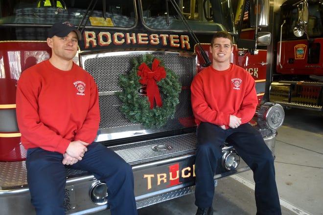 Rochester firefighters Joseph Riley, left, and Kevin Banks recently returned from a 6-month deployment mission for the N.H. Air National Guard. [Deb Cram/Fosters.com]