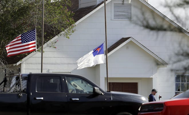 Flags fly at half-staff as law enforcement officials investigate the scene of a shooting at the First Baptist Church of Sutherland Springs, Texas, in a file photo from November. Jefferson County is offering safety awareness training to local churches in the wake of several deadly shootings at places of worship across the nation. [Eric Gay/Associated Press/File]