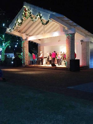 Baytowne Wharf had a big night Dec. 13 with Donnie Sundal performing a few of his holiday favorites, plus members of the Fort Walton Beach High School Valhalla Choir took the stage for a special Christmas opener. [SPECIAL TO THE LOG]