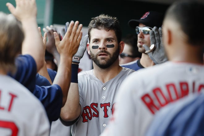 Mitch Moreland will be back at first for the Red Sox next year. [John Minchillo/The Associated Press]