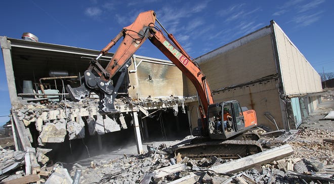 Demolition begins on the former Sears building on West Franklin Boulevard Tuesday afternoon, Dec. 19, 2017. [Mike Hensdill/The Gaston Gazette]