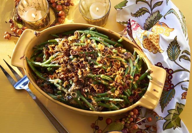 The sauce with this modern green bean casserole is a lovely medley of sauteed fresh mushrooms and a blend of broth and half-and-half. (Mia via AP)