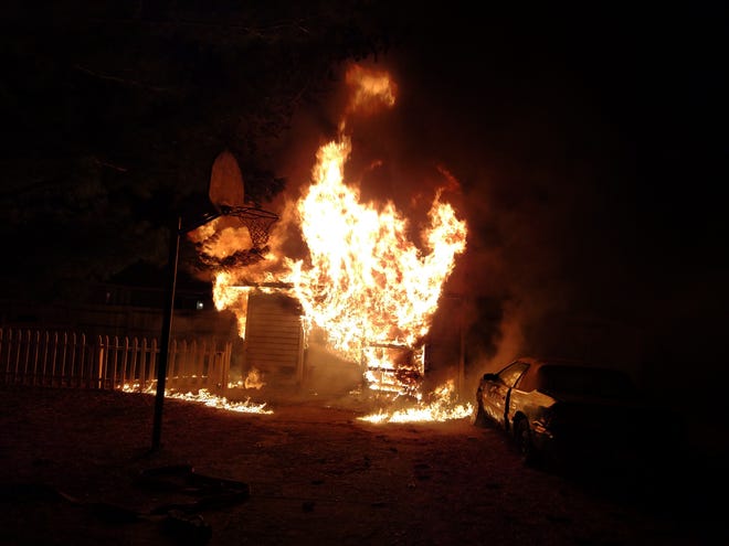 Belvidere firefighters were called just after 12:24 a.m. on Wednesday, Dec. 20, 2017, to a garage fire at 1420 Union Ave., Belvidere. A neighbor spotted the garage on fire and ran to the house to alert the tenants, fire officials said. [PHOTO PROVIDED]