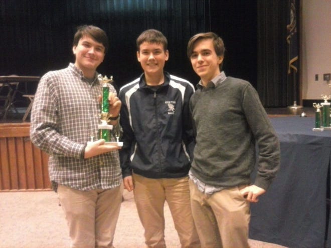 Andrew McElroy, Noah Robinson, Tyler Silverwood and Sawyer Rogers (not pictured) earned first place in the intermediate level at the Granite State Certamen. [Courtesy Photo]