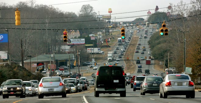 Drivers fill U.S. 74 on Thursday afternoon in Shelby. Traffic is expected to increase on North Carolina roads due to the holiday weekend. [Brittany Randolph/The Star]