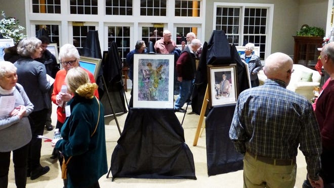 The Oak Point Art Association recently hosted its annua Winter Art Affair, providing a showcase for Oak Point artists. Here, visitors to the exhibit mingle in the Oak Poing Ball Room. [Submitted]