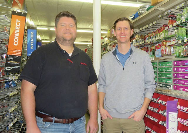 Third generation hardware store owners, brothers Jason (left) and Dustin Kempker, recently purchased Quick’s Hardware Hank. As of Dec. 13, the store is now Kempker’s True Value. Photo by Kim Harms