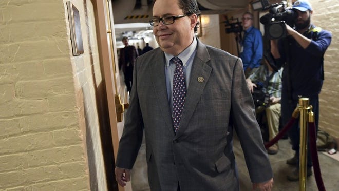 In this Dec. 19, 2017, photo, Rep. Blake Farenthold, R-Texas, arrives for a meeting of House Republicans on Capitol Hill in Washington. The House Ethics Committee is expanding its investigation of Farenthold to determine whether he lied to the committee in its inquiry into sexual harassment allegations. The panel is also reviewing whether he directed his congressional staff to work on his election campaigns. Farenthold is the subject of an investigation into whether he sexually harassed a former member of his staff. (AP Photo/Susan Walsh)