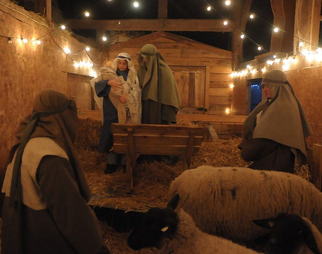 A live nativity scene at the Critter Barn portrays Joseph, Mary and baby Jesus. [SENTINEL FILE]