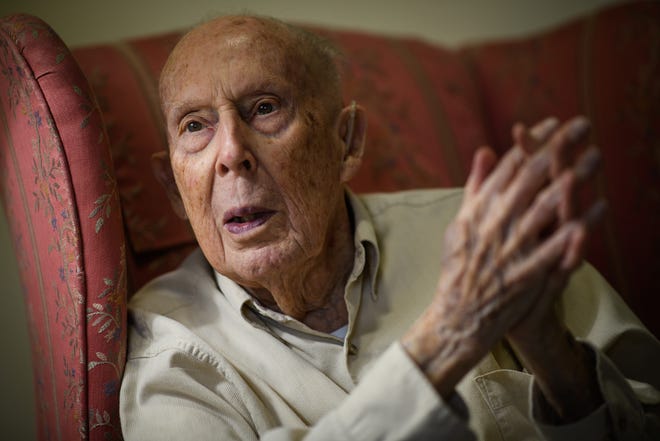 'We always had a big tree in the halls and had stockings on the mantle,' says Hamilton Underwood, who is 100. [Andrew Craft/The Fayetteville Observer]