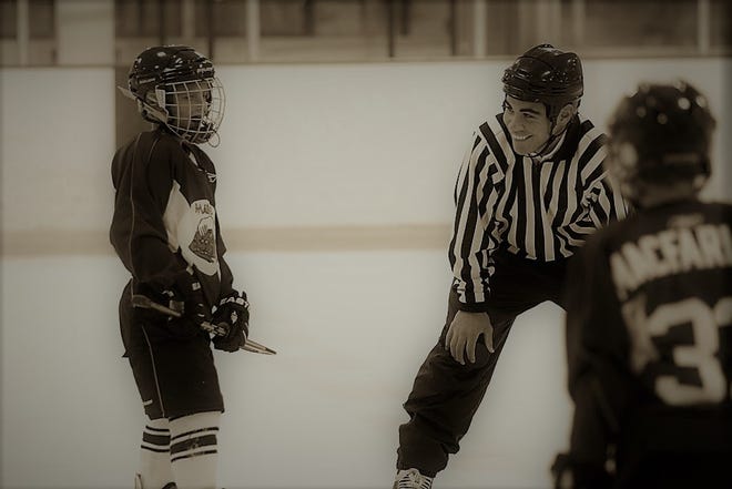 Referee Jeremy Tufts, who can trace his background in officiating to The Rinks at Exeter, is one of three Americans selected to officiate games at the World Junior Championship, which opens in Buffalo, N.Y., on Tuesday. [Courtesy photo]