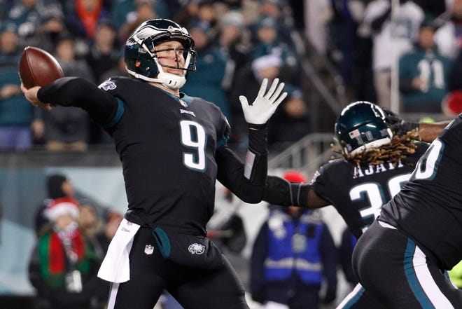 Philadelphia Eagles' Nick Foles passes during the first half against the Oakland Raiders on Monday in Philadelphia. [ASSOCIATED PRESS]