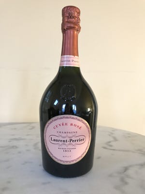 The French Champagne Laurent-Perrier Cuvée Rosé unique bottle shape was inspired by the bottles used during the time of Henry IV in the 16th and 17th centuries. [Photo by JoAnn Actis-Grande]