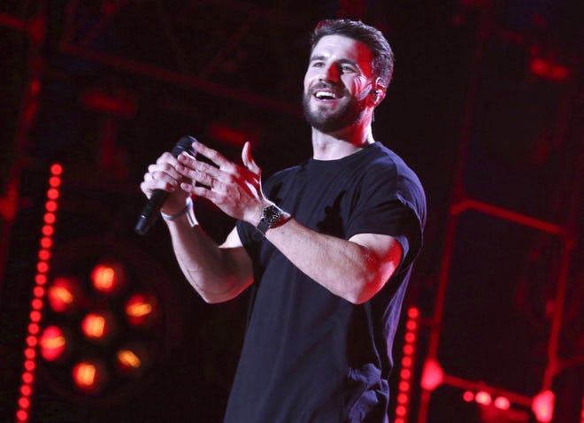 In this June 2017 file photo, Sam Hunt performs at the 2017 CMA Music Festival in Nashville, Tenn. Hunt's "Body Like a Back Road" was named as one of the top songs of the year by the Associated Press. (Photo by Laura Roberts/Invision/AP)