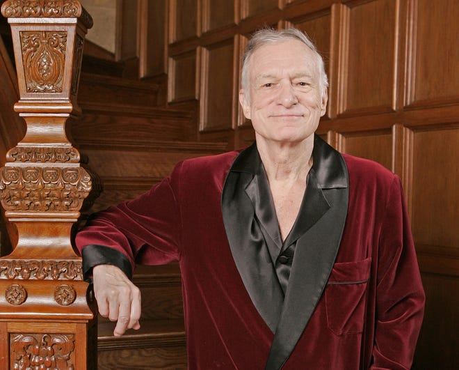 FILE - In this April 7, 2006 file photo, Playboy founder Hugh Hefner poses at the Playboy Mansion in the Holmby Hills area of Los Angeles. Hefner was among the notable figures who died in 2017. (AP Photo/Kevork Djansezian, File)