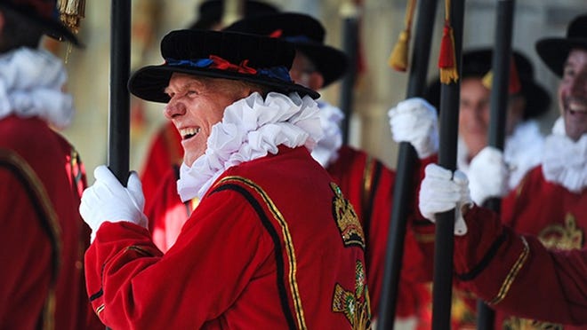 Bob Jackson, of Palm Beach, dressed as the Head Beefeater, has a laugh before last year's Boar's Head and Yule Log Festival dress rehearsal at the Episcopal Church Bethesda-by-the-Sea.