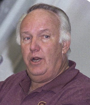 Southern Cal head coach John Robinson answers questions during a post Rose Bowl news conference after the Trojans defeated Northwestern 41-32 on Monday, Jan. 1, 1996 in Pasadena, California. (AP Photo/Mark J. Terrill)