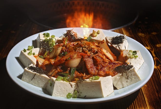 The kimchi stir-fried tofu at Iron Age Korean BBQ [ERIC ALBRECHT/DISPATCH]
